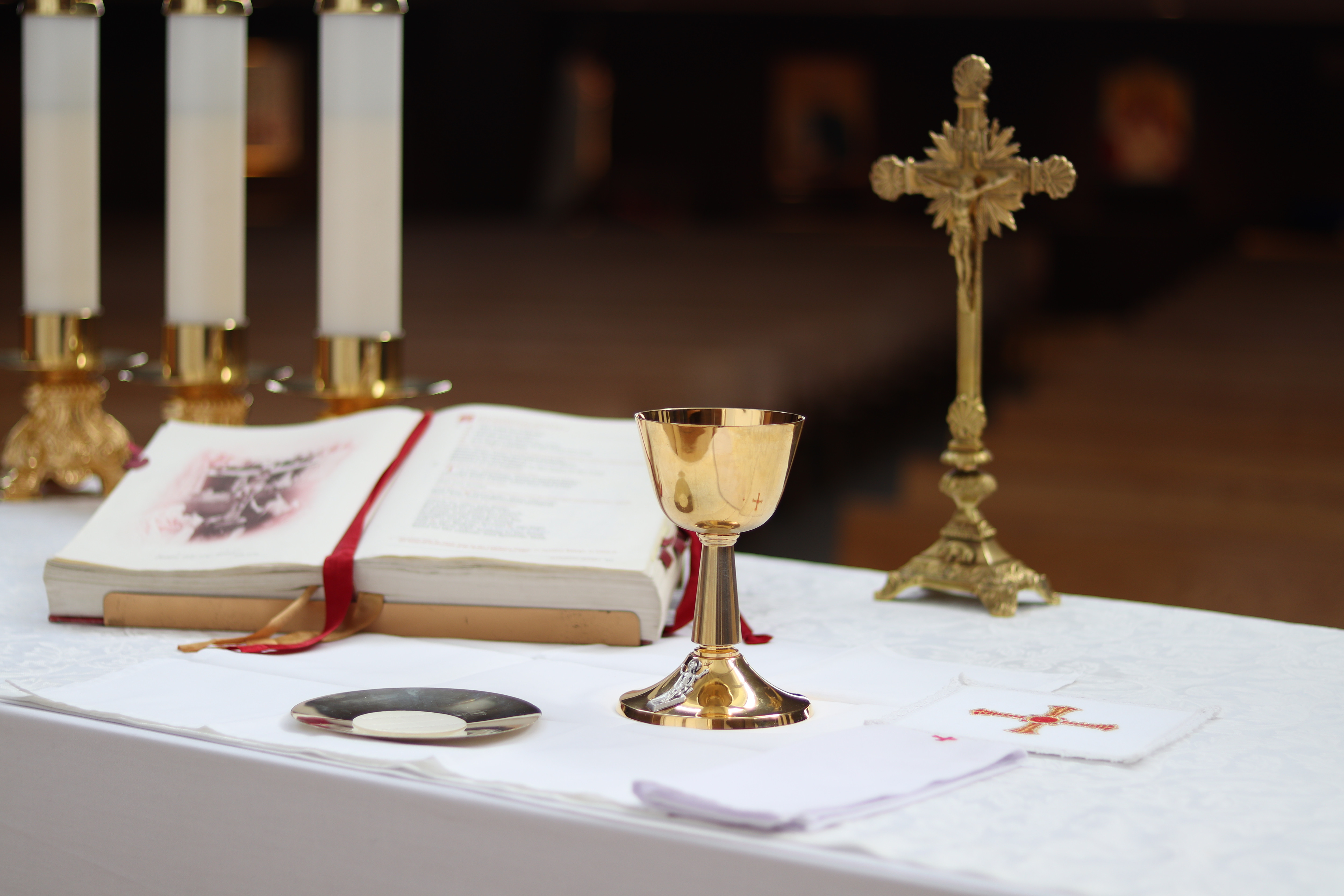 The Sacred Altar at St Timothys with Chalice, Paten, Roman Missal and candles