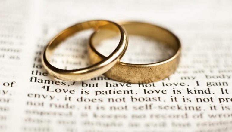 wedding rings on Bible scripture